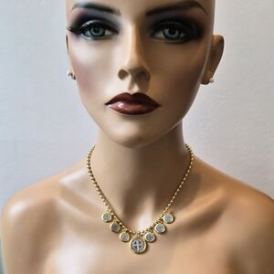 Elegant Gold and Silver Necklace with Medallions